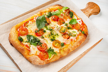 tasty pizza on the wooden board