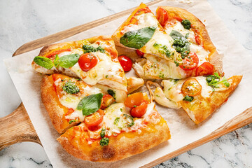 tasty pizza on the wooden board