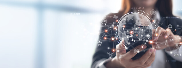 Digital marketing, IoT, Internet of Things, global business concept. Business woman using mobile...