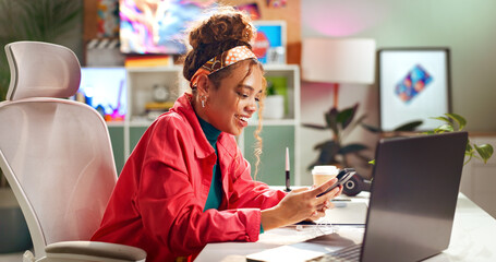 Woman, laptop and happy for phone in home office for digital agency, content creation and client...