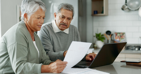Senior couple, paperwork and laptop for finance, taxes and review with pension, budget and reading...