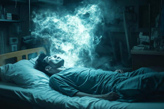 Soul leaving body of dead man lying on bed in Emergency room of hospital