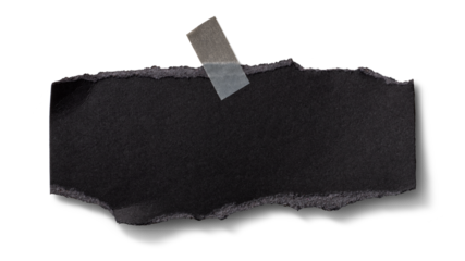 壁にテープで貼られた、黒い紙の断片