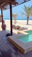 Experience perfect blend of eco-conscious living and historical charm at beachfront hotel villa Enjoy swimming pool white sand palms in environment that prioritizes sustainability and heritage design