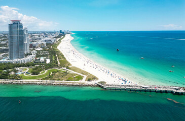 Obraz premium Aerial view of beautiful Miami Beach city, Florida, United States. Drone shot of Miami on sunny day. Miami Beach, wonderful aerial view of buildings. Panorama view of Miami Beach, South Beach, USA.