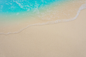 wave on the empty beautiful beach, top view