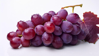 Fototapeta premium Red grape with leaves isolated on white background.