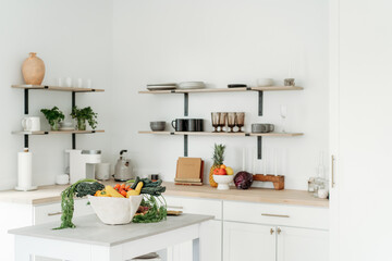 minimalist kitchen with bright vegetable bowl