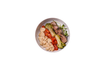 Bowl with slices of baked tuna with broccoli, tomatoes and fusili pasta