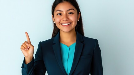A confident woman in professional attire smiling and gesturing with one finger raised, symbolizing an idea or suggestion.
