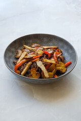 Black rice noodles with pork meat and mushrooms