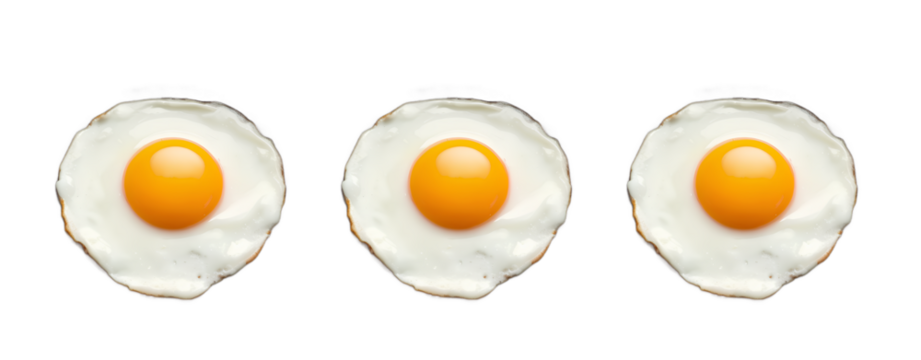 Three sunny-side-up eggs with bright yellow yolks and slightly crispy edges, arranged side by side.