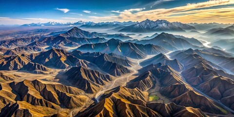 Stunning Aerial View Of Layered Mountain Ranges With Rolling Terrain And Distant Peaks