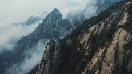 Aerial Panorama of Yellow Mountains: Iconic Pine Trees, Mist-Cloaked Peaks, Ethereal Seclusion, Ideal for Nature Enthusiasts
