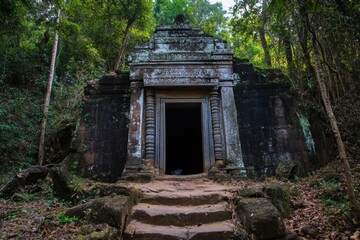 Fototapeta premium Ancient temple gateway in lush