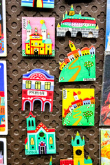 Naklejka premium Colorful Prague magnets on a display board, perfect for Czech Republic souvenirs and travel memories during Christmas vacations