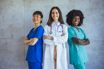 Diverse Medical Team Smiling in Hospital Hallway