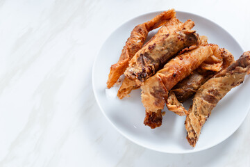 Pisang Aroma or Pisang Cokelat (Piscok), Indonesian traditional snack. Made of banana, chocolate and sugar wrapped in flour sheet. Perfect for recipe, article, catalogue, commercial. 