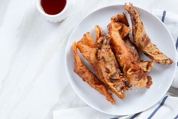 Pisang Aroma or Pisang Cokelat (Piscok), Indonesian traditional snack. Made of banana, chocolate and sugar wrapped in flour sheet. Perfect for recipe, article, catalogue, commercial. 