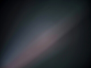 Abstract color shapes on dark background with small texture. Light rays. Elements for design.