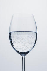 poured mineral water in wine glass