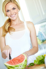 Slicing, portrait and woman with watermelon, home and smile for nutrition, fruit and vitamin c for health. Kitchen, hydration and chopping of food, potassium and wellness of person, morning and house