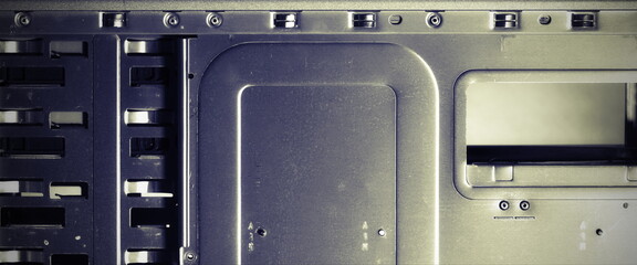 Metal computer case close-up. Computer Accessories Conception. Digital Wallpaper. Monochrome