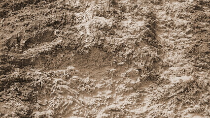 A mountainous sandy surface. Natural reddish texture