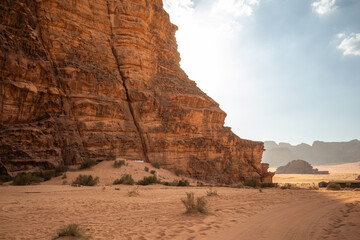 Outdoor Scenery of Wadi Rum in Southern Jordan. Beautiful Desert Landscape of Rock Formation and Sandy Ground in the Middle East.