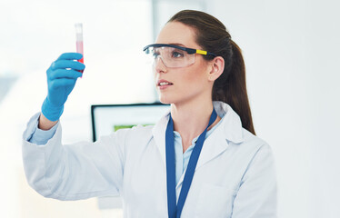 Science, woman and test tube in laboratory for results, chemical and blood sample for healthcare....