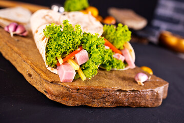 Fresh tortilla wraps with ham cheese and vegetables