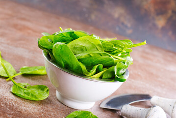 Heap of baby spinach leaves on a table