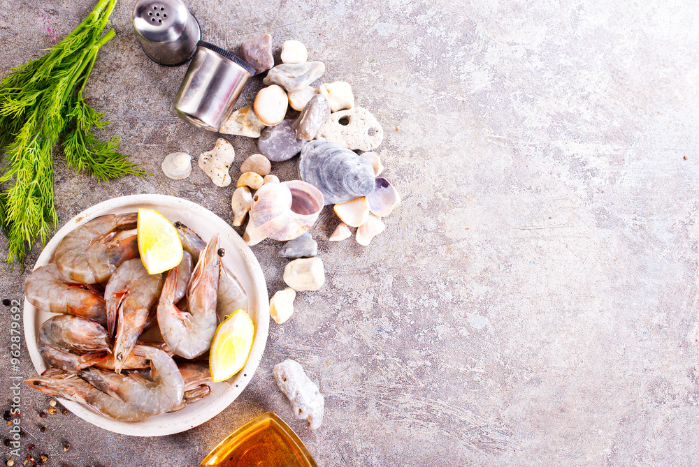 Wall mural raw shrimps on white plate