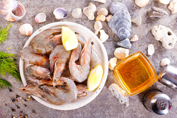 raw shrimps on white plate