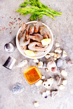 raw shrimps on white plate