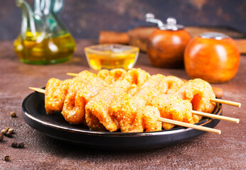 Raw chicken meat shish kebab skewers. chicken with spice