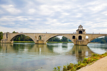 Fototapeta premium Avignon Bridge with Popes Palace and Rhone river, Provence, France. 