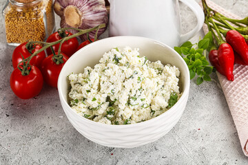 Curd cheese with green herbs