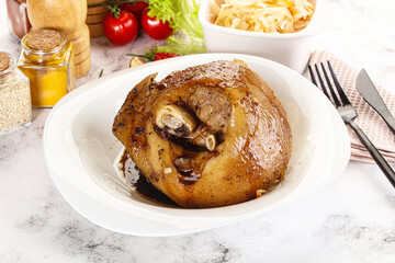 Baked pork knee with spices