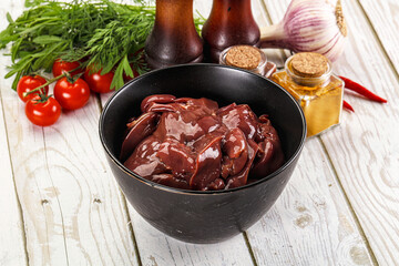 Raw chicken liver uncooked in the bowl
