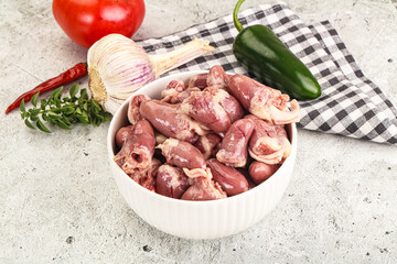 Fresh raw chicken hearts in the bowl