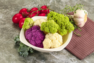 Raw cauliflower different colors heap