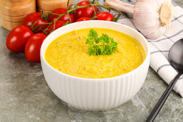 Vegetarian corn cream soup served parsley