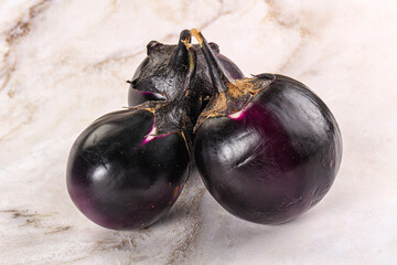 Raw violet and black eggplant