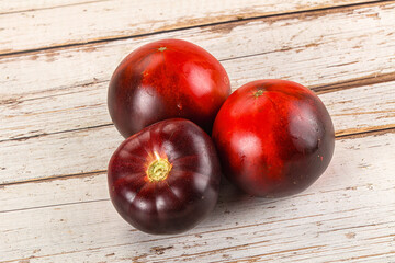 Black ripe juicy organic tomato