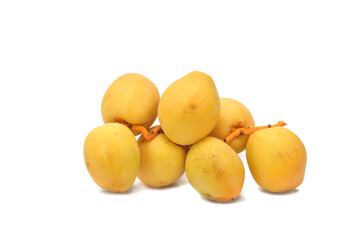 Fresh ripe yellow dates fruits branch isolated on white