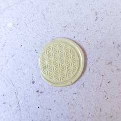 wax stamp coin on ;ight background. sealing wax for wedding invitation or letter for a vintage look