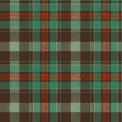 Green, red and brown tartan plaid. Scottish pattern fabric swatch close-up. 