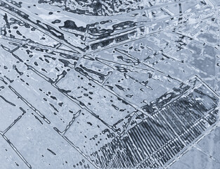 broken background. Horizontal metallic steel plate. Urban style backdrop in light gray colors. Cool colored simple design of textured surface with glow metal effect.