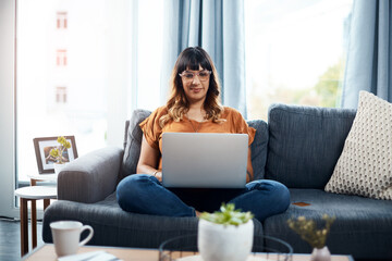 Typing, relax and woman with laptop, couch and ideas for composer, digital and writing of lyrics...